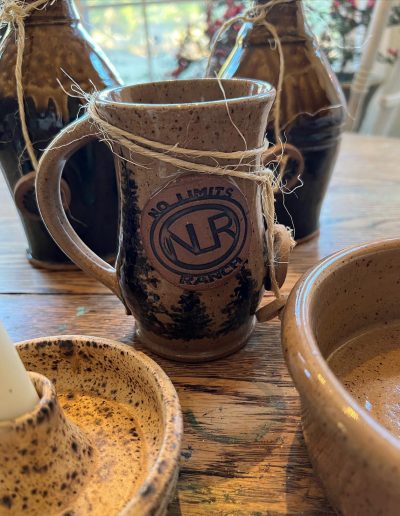 Custom brand wear with hand, glazed pine trees
